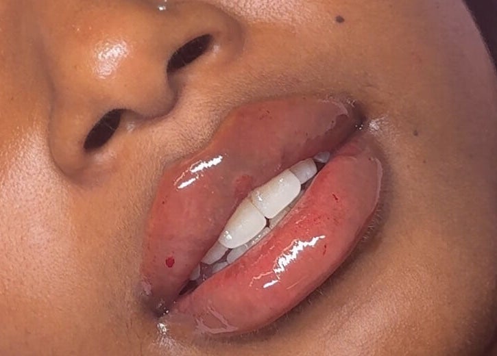 Close-up of glossy lips at Skin & Beauty By Ells, Luton, England, GB, showcasing expert lip care.