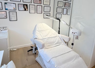 Treatment room at Skin Spa Home Beauty Studio, Collaroy Plateau, New South Wales, AU with certificates displayed.