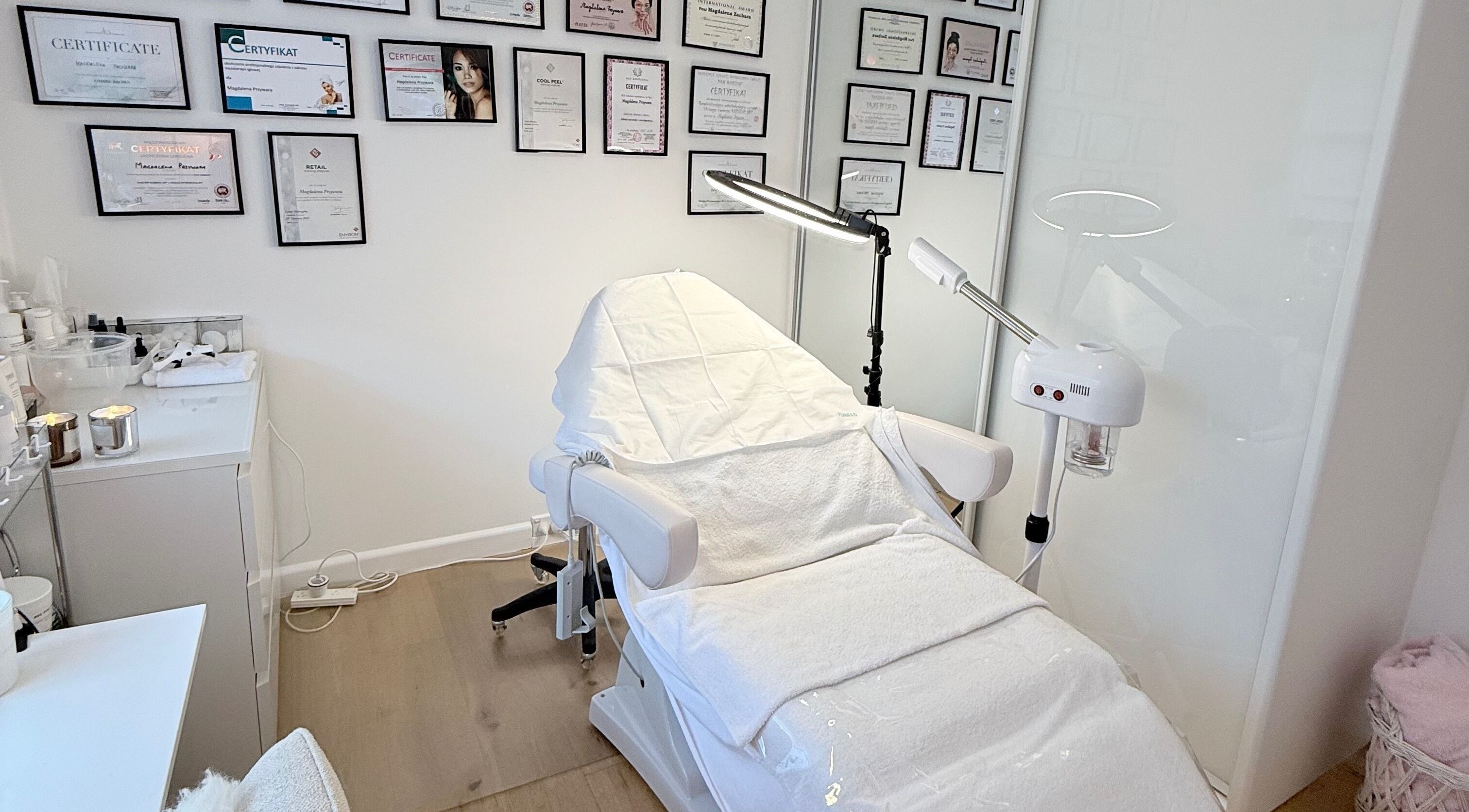 Treatment room at Skin Spa Home Beauty Studio, Collaroy Plateau, New South Wales, AU with certificates displayed.