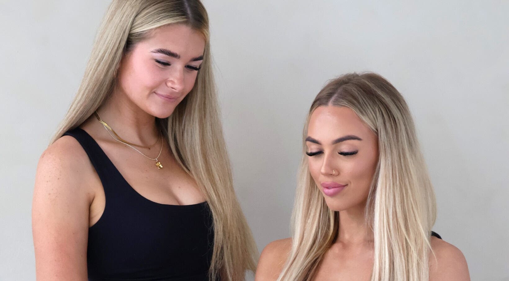 Stylists perfecting lash designs at The Lash Edit, Merrimac, Queensland, AU, showcasing beauty expertise.