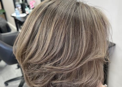 Stylish blonde highlights at Natnicha's Hair Care in Kallangur, Queensland, AU.