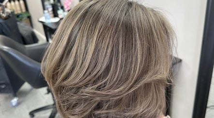 Stylish blonde highlights at Natnicha's Hair Care in Kallangur, Queensland, AU.