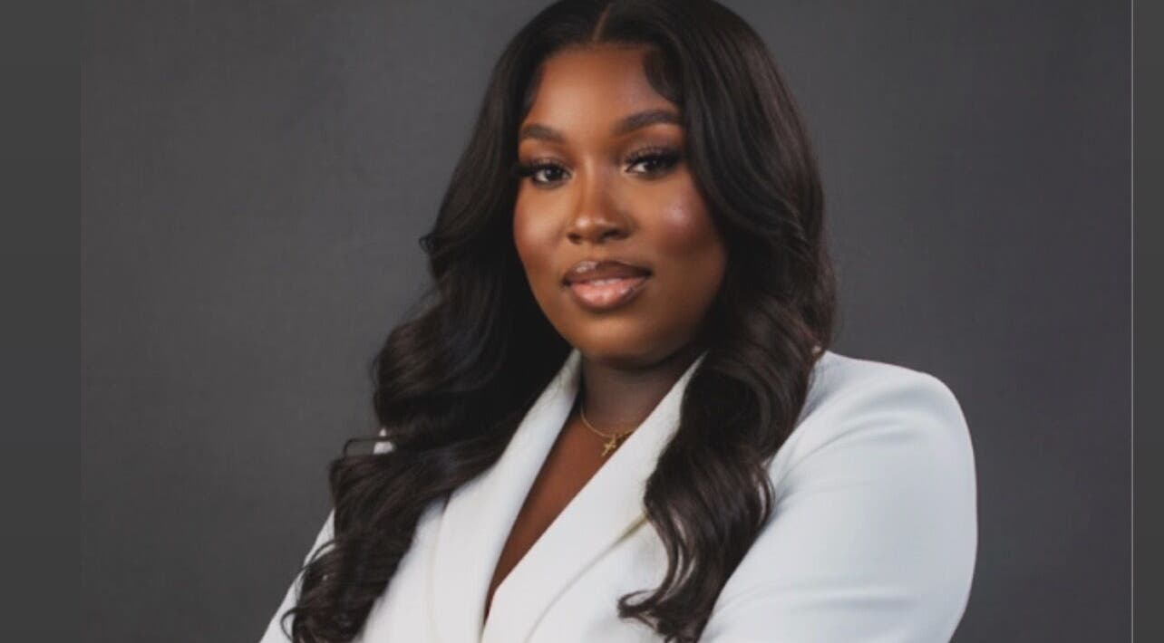 Professional stylist at Beauty Refinery by Lia, Kingston 20, Kingston, JM, showcasing elegant coiffure.