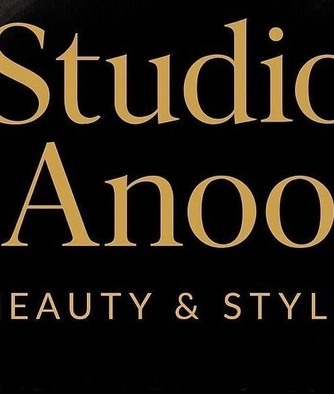 Studio Anoo logo with 'Beauty & Style', T'bilisi, Tbilisi, GE in stylish gold on black.