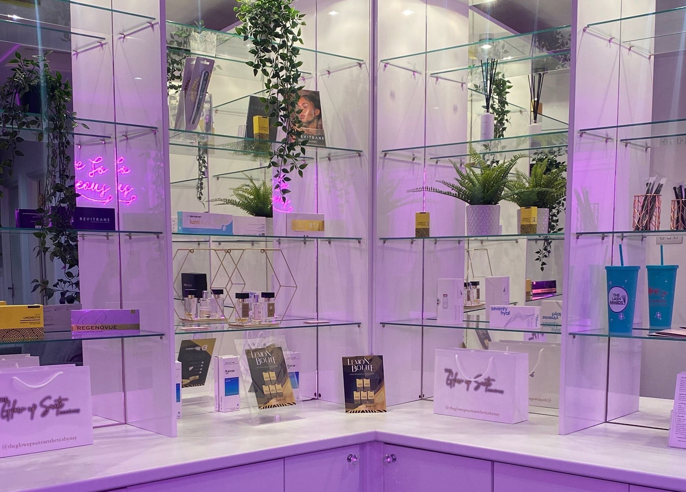 Stylish beauty product display at Platinum Brush Makeup and Beauty in Shepshed, England, GB, with lush greenery.