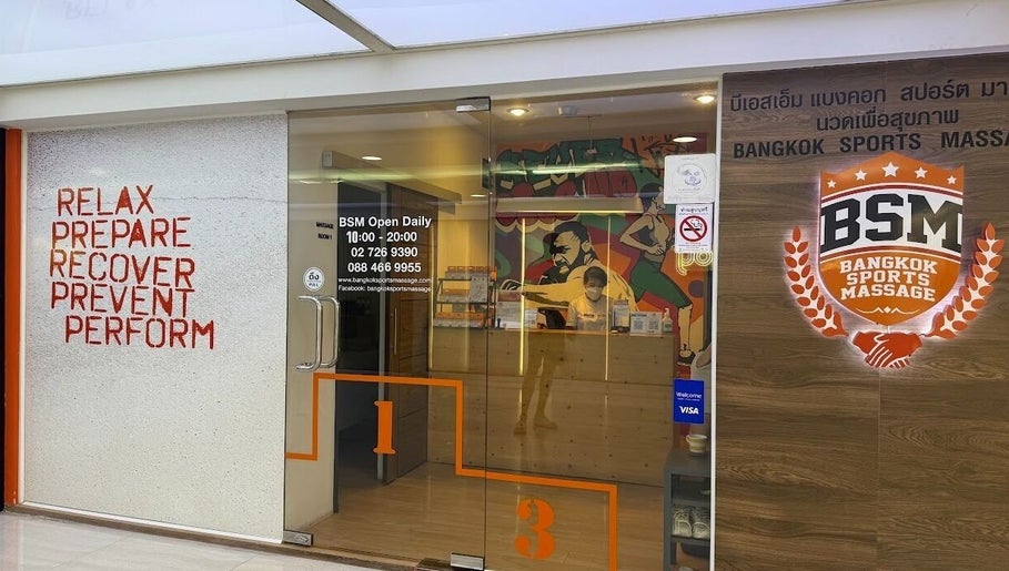 Entrance of Bangkok Sports Massage Thonglor in Wattana, Bangkok, TH with welcoming decor.