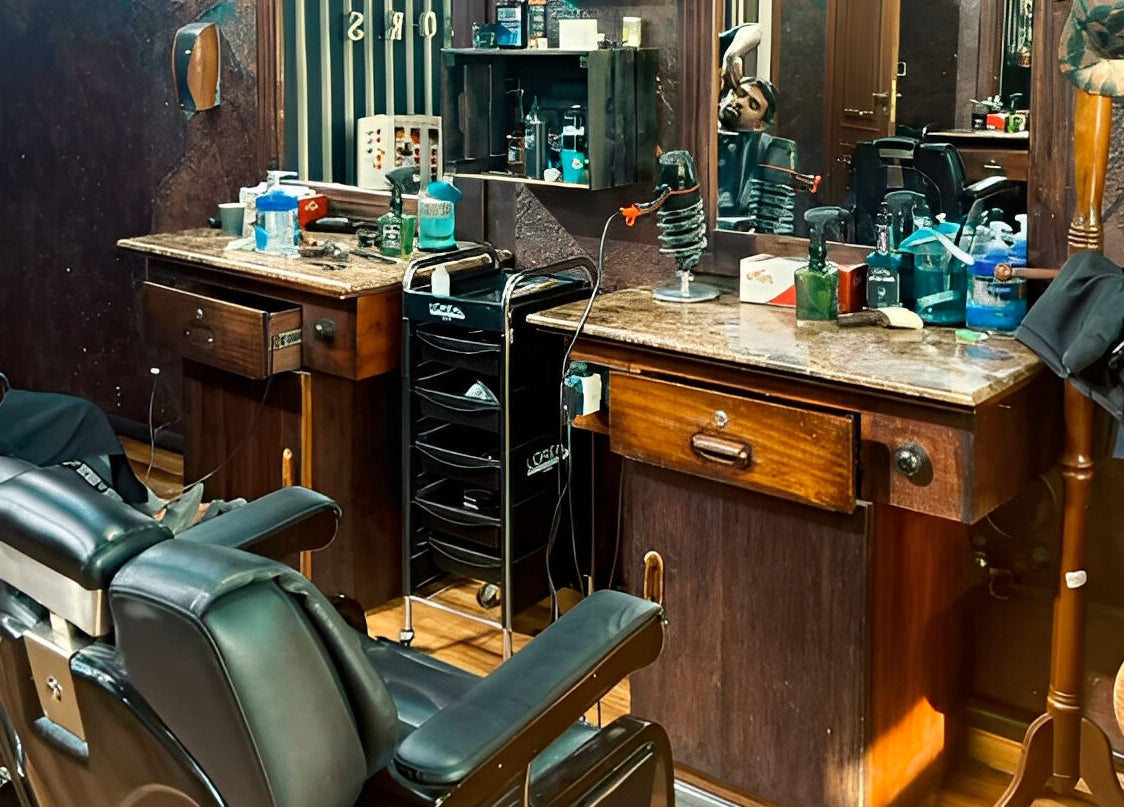 Barber station at Le Mirage, Doha, Doha Municipality, QA, featuring classic chairs and grooming tools.
