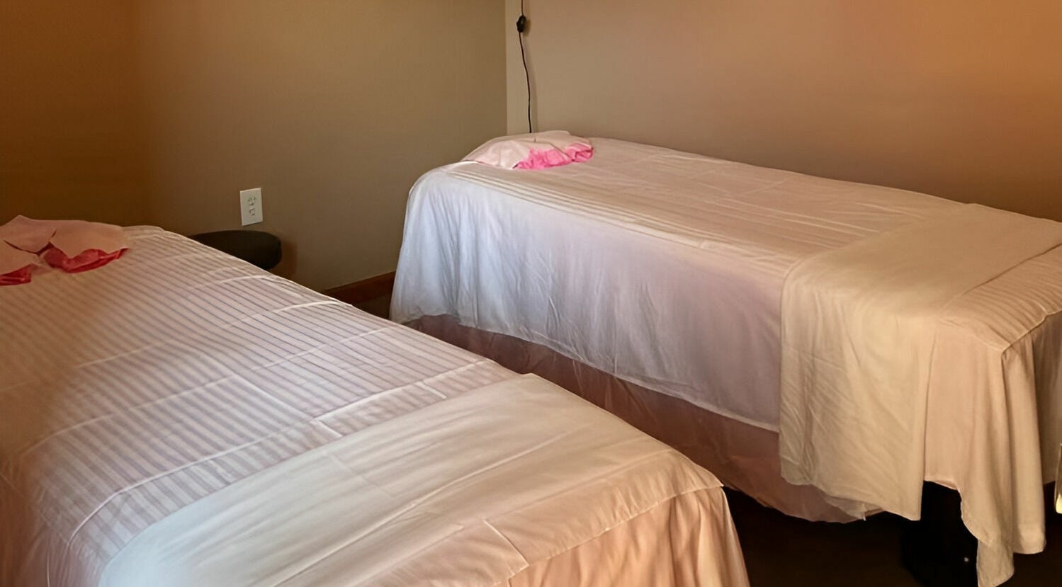 Tranquil massage room with twin beds at Massage Advanced Spa, Rockville, Maryland, US.