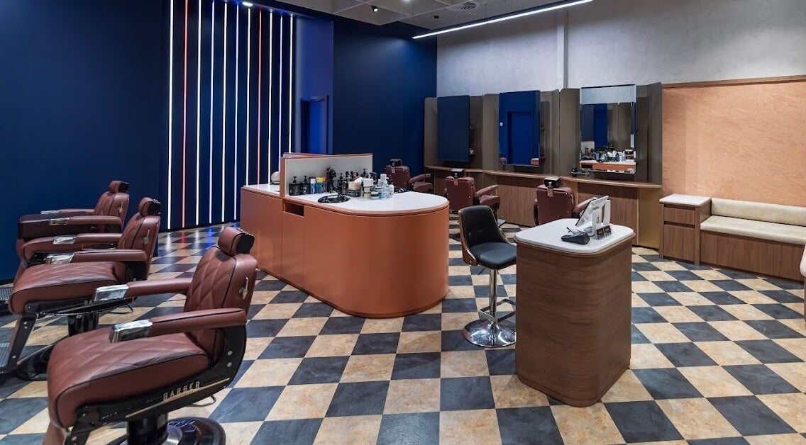 Modern barbershop interior at Barber Industries - Belmont, Cloverdale, Western Australia, AU with sleek chairs.