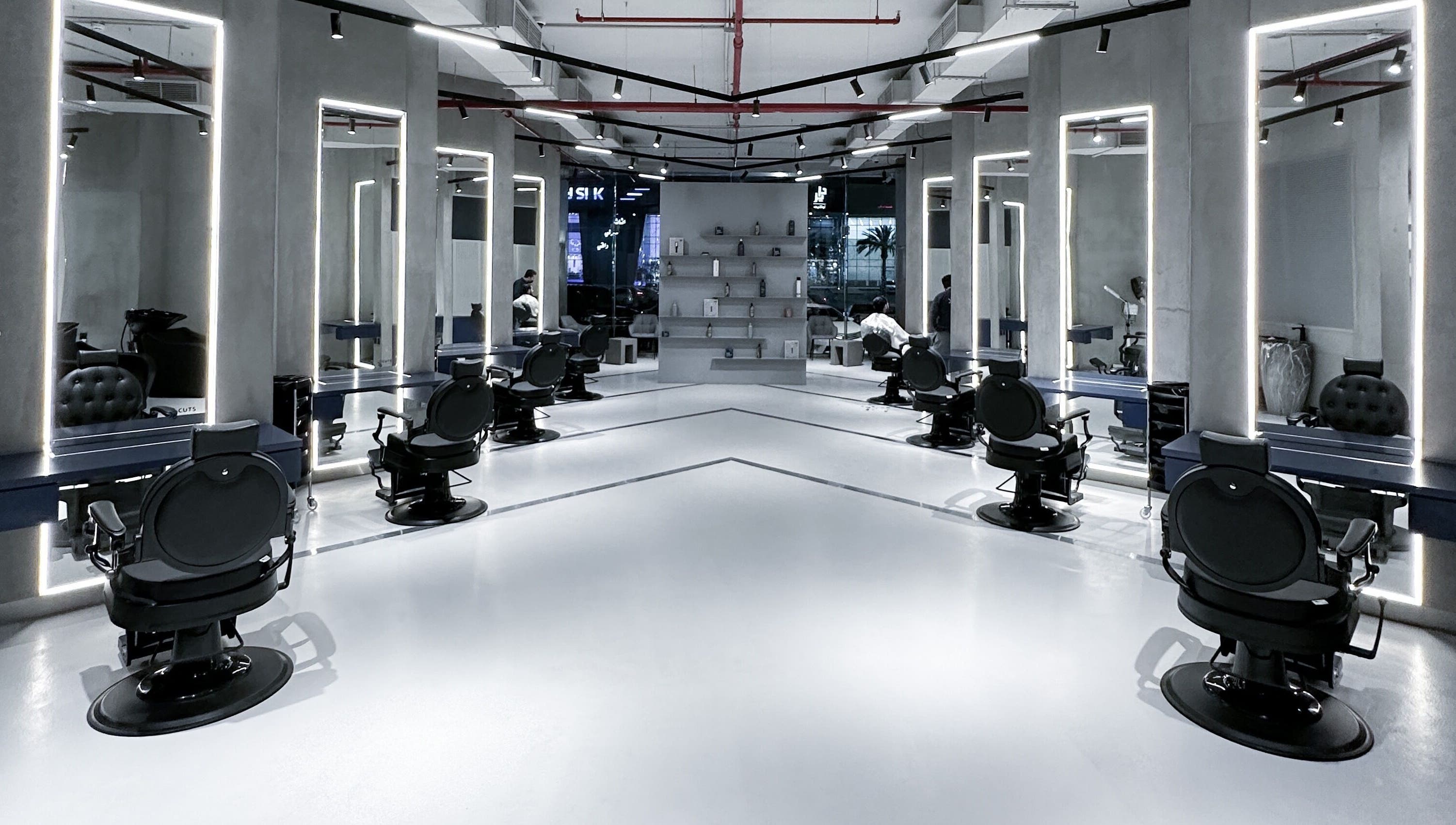 9CUTS Barber Shop interior with sleek black chairs in Riyadh I الرياض, SA.