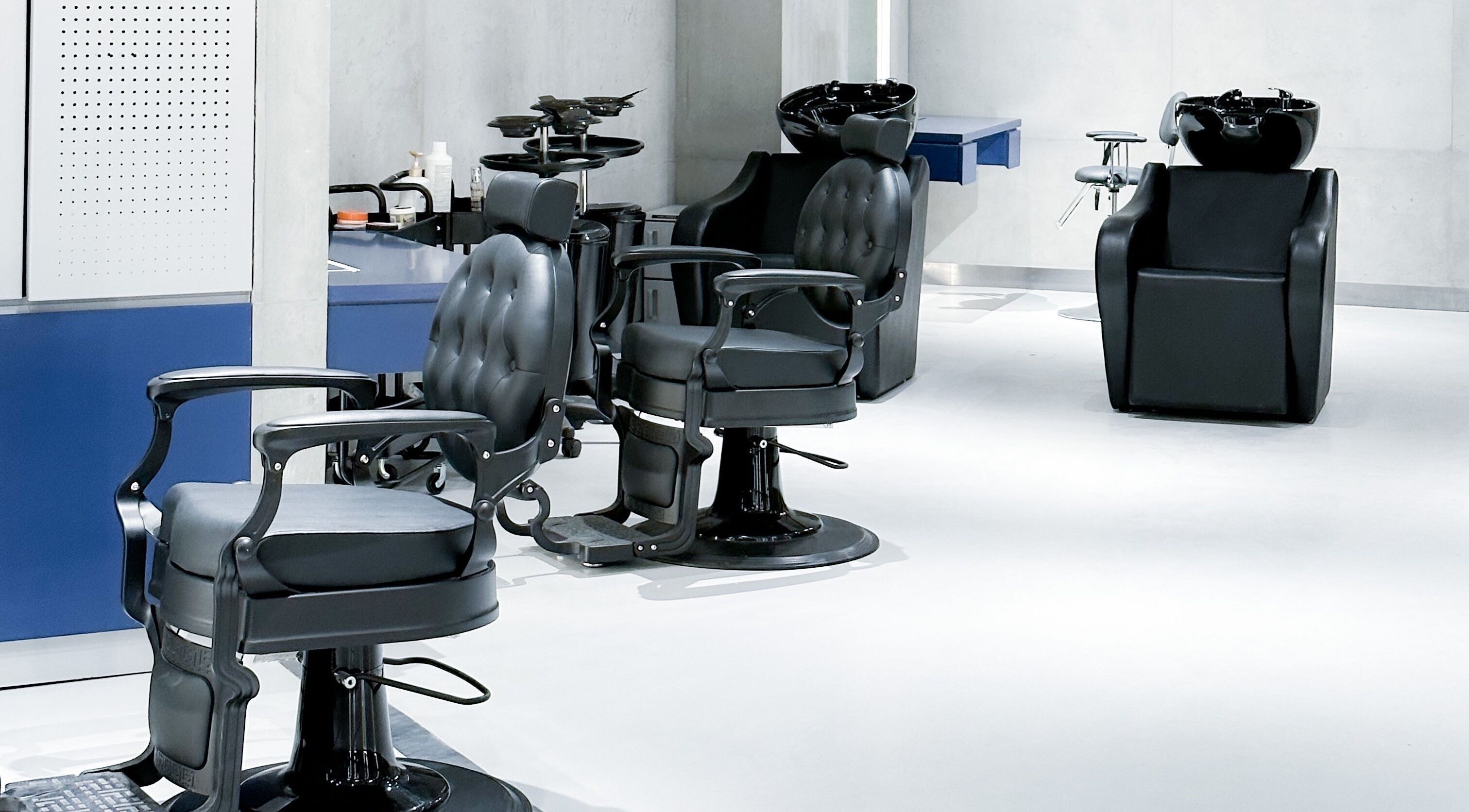 Modern styling chairs at 9CUTS Barber Shop, Riyadh I الرياض, SA enhance client comfort.