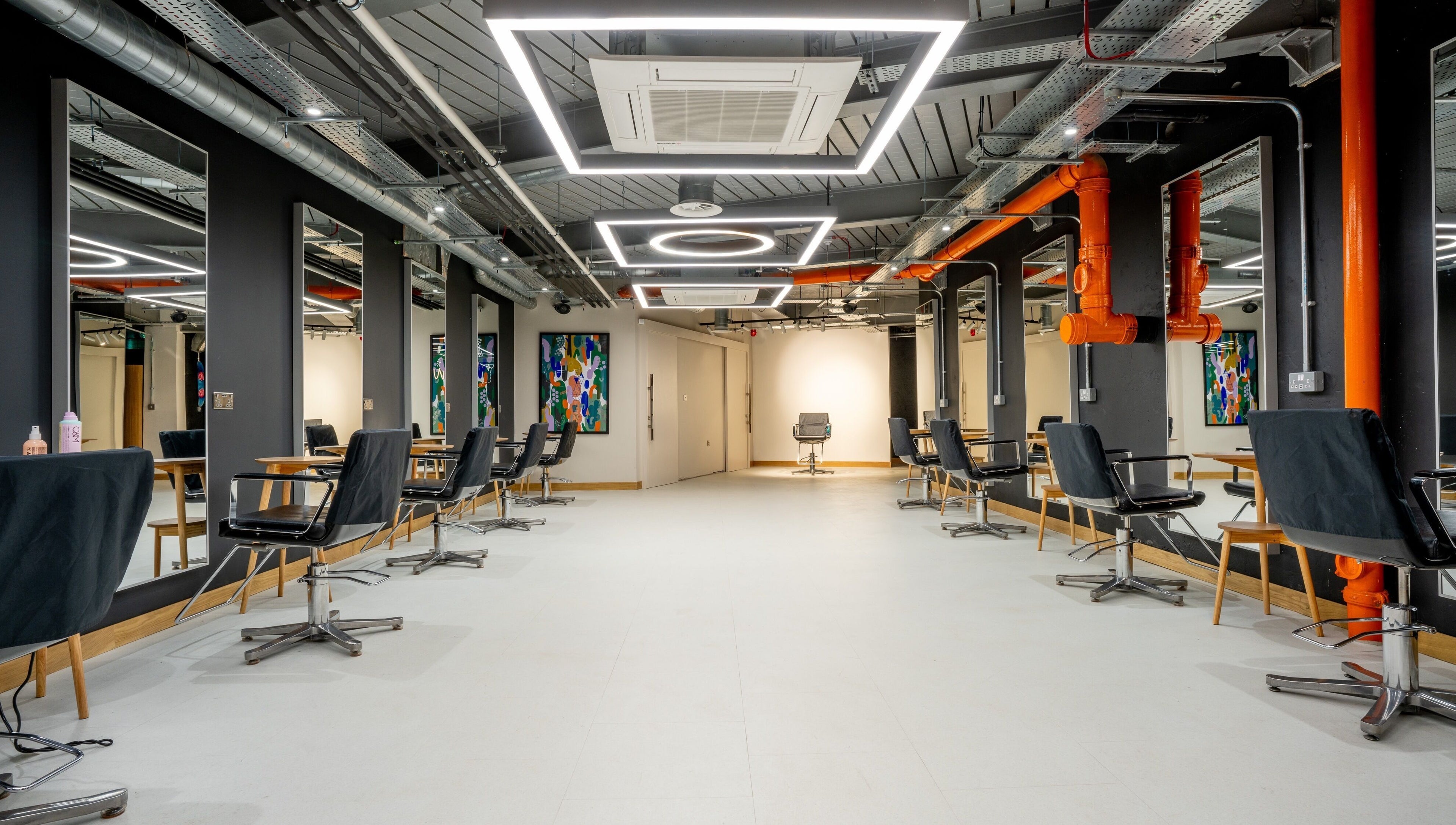 Interior view of modern Gareth Vance Salon in Leeds, England, GB, featuring stylish salon chairs and mirrors.