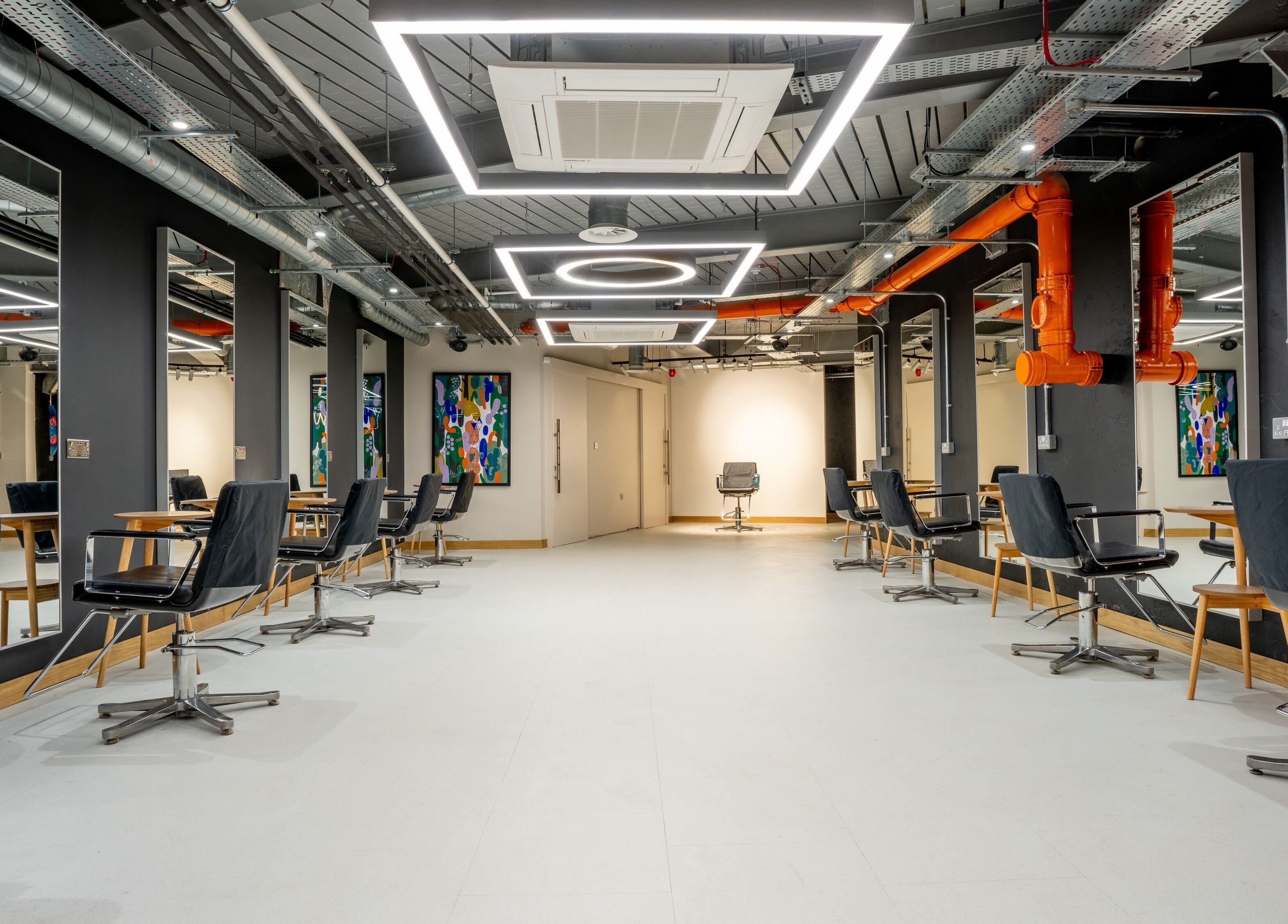 Interior view of modern Gareth Vance Salon in Leeds, England, GB, featuring stylish salon chairs and mirrors.