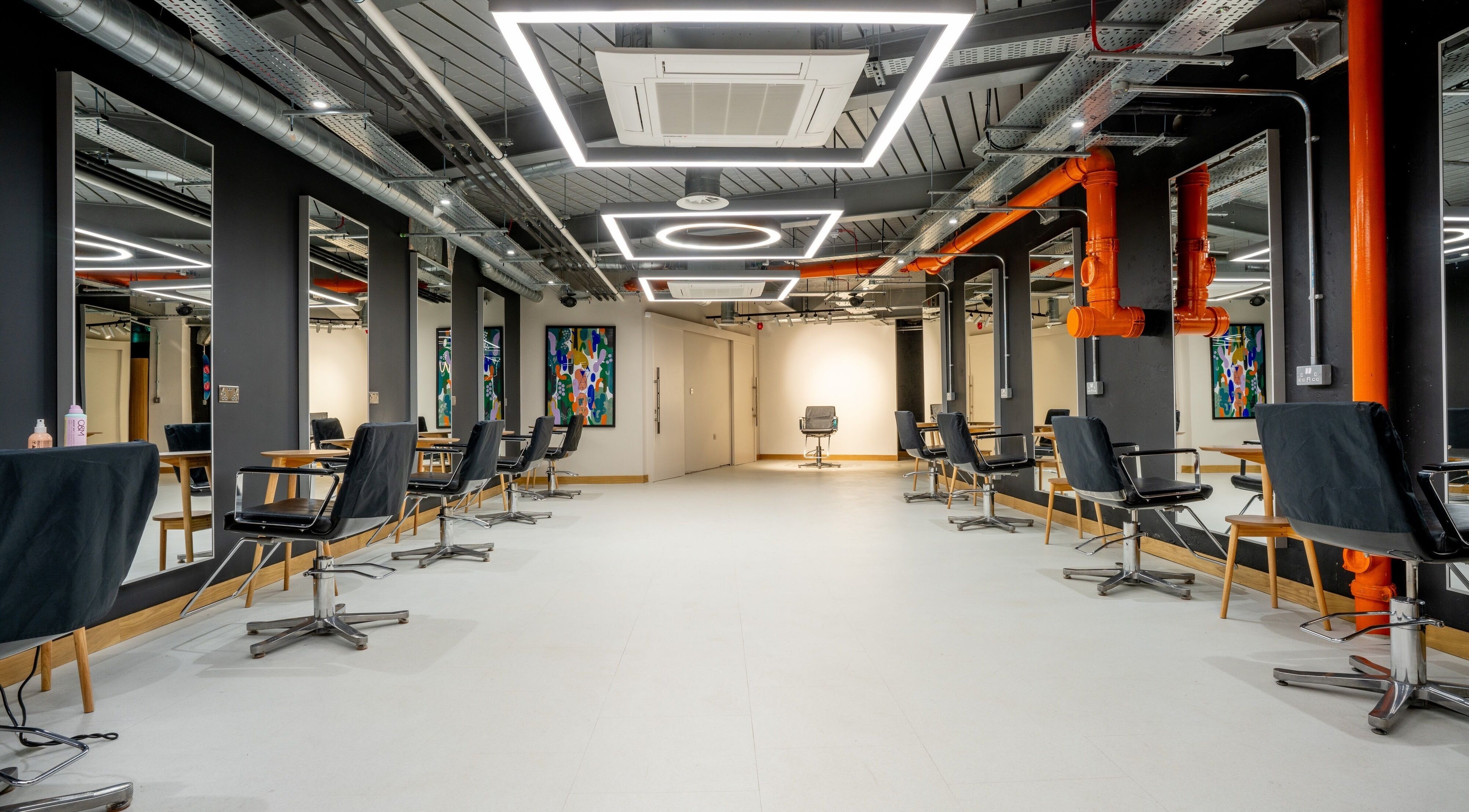 Interior view of modern Gareth Vance Salon in Leeds, England, GB, featuring stylish salon chairs and mirrors.