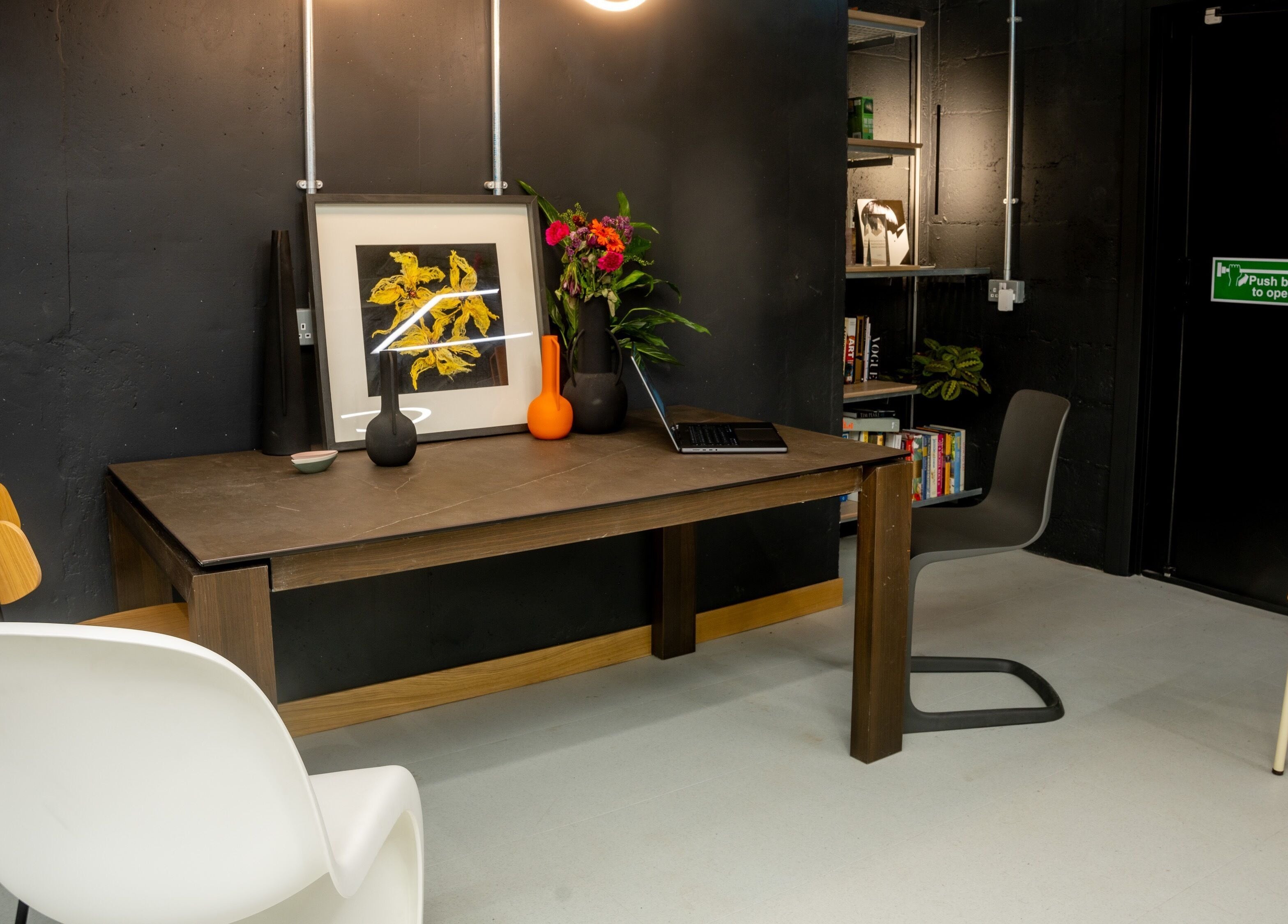 Modern office setup at Gareth Vance Salon, Leeds, England, GB with art and contemporary seating.