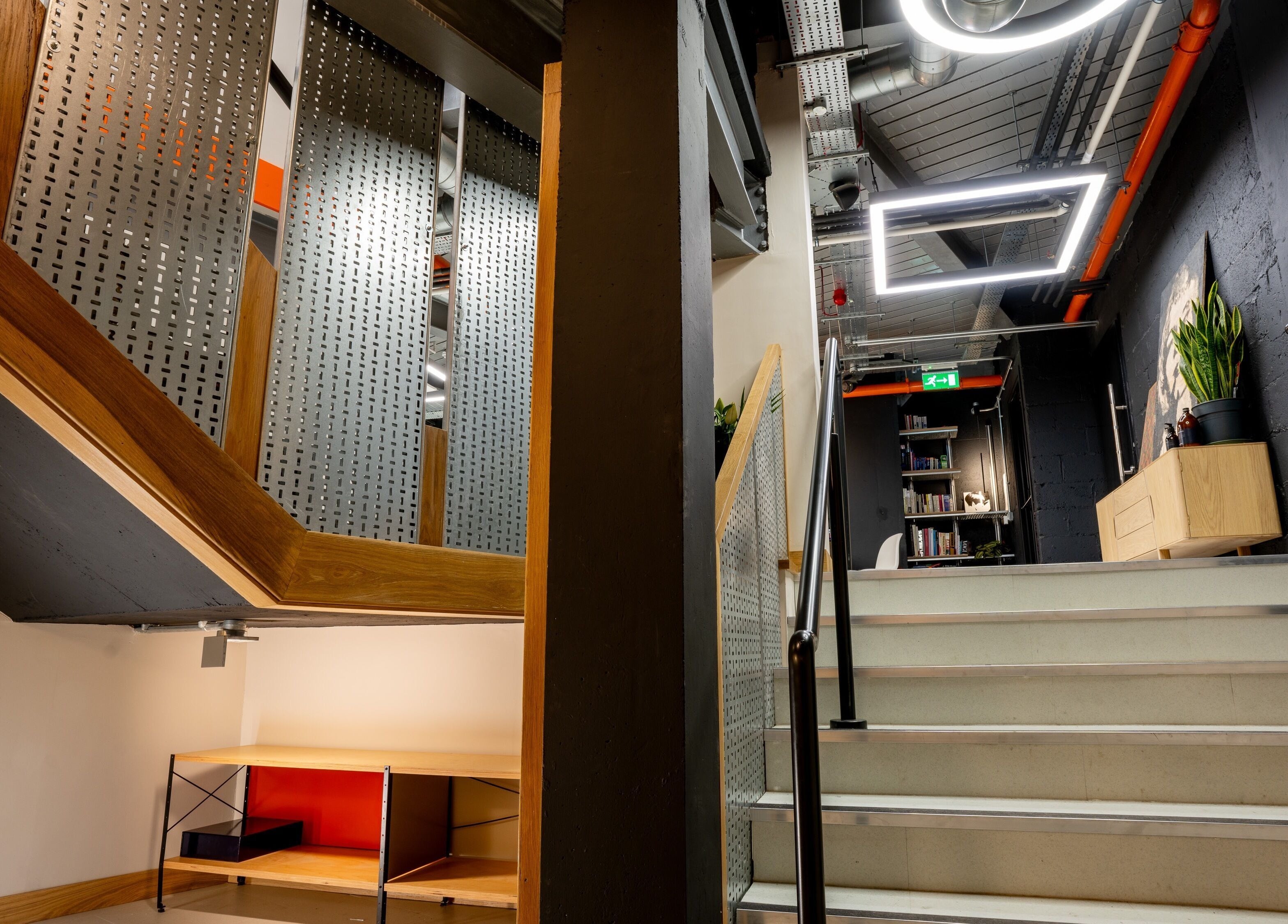 Stylish industrial staircase at Gareth Vance Salon, Leeds, England, GB, featuring sleek metal design.