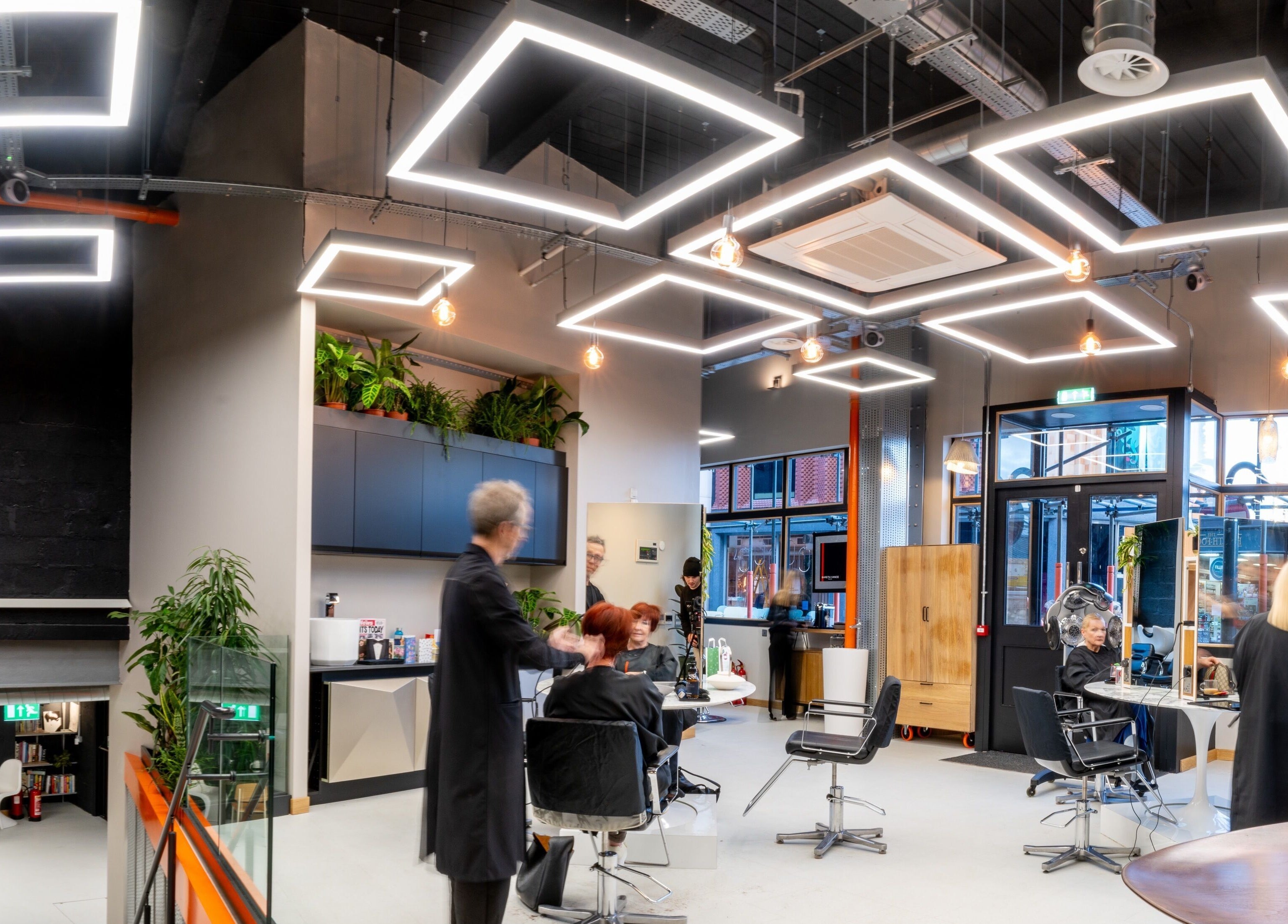 Gareth Vance Salon interior in Leeds, England, GB, showcasing contemporary lighting and stylish decor.