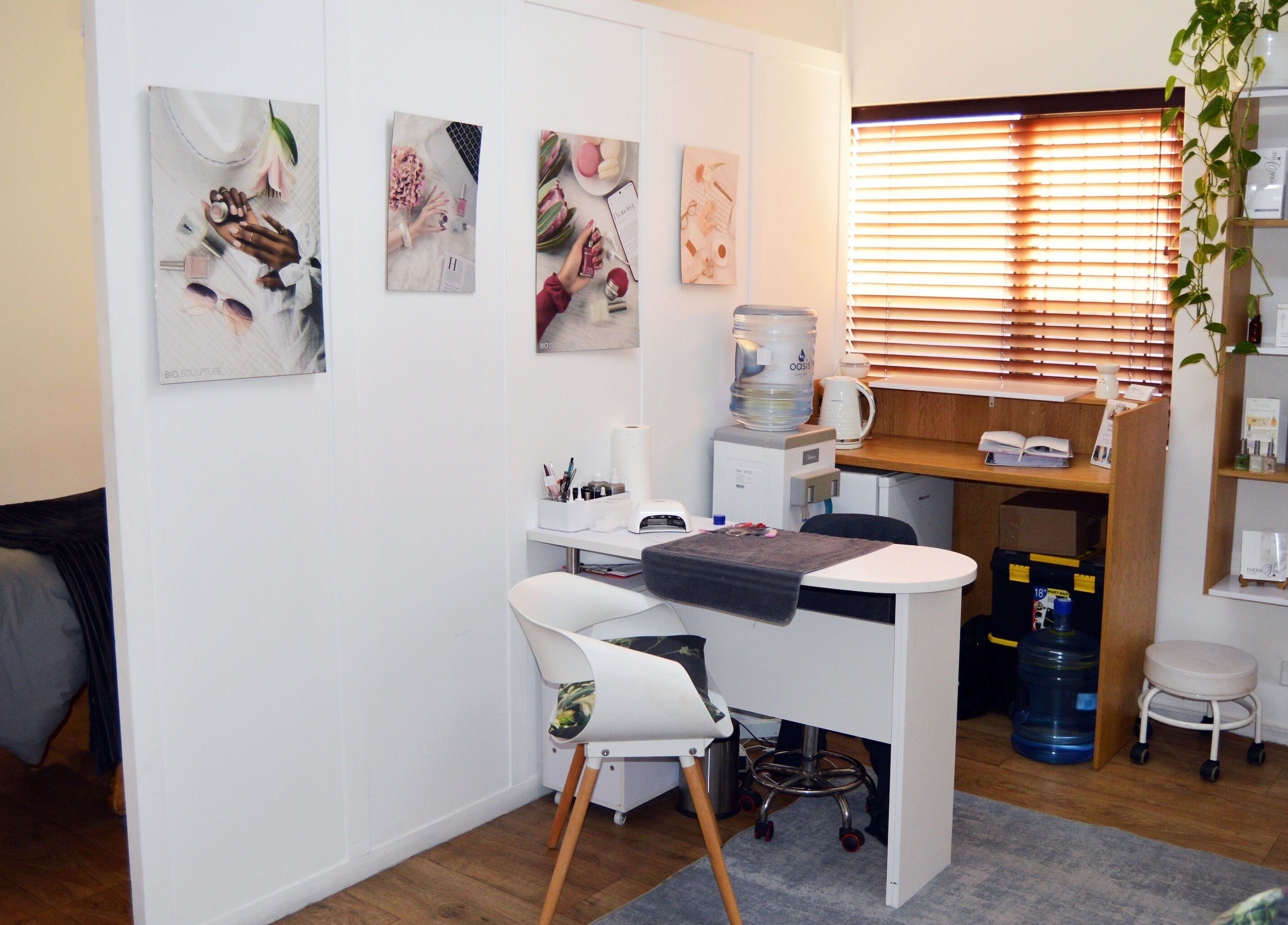 Chic interior of Lindsay Jordaan Beauty Boutique, Cape Town, Western Cape, ZA. Elegant decor and beauty products displayed.