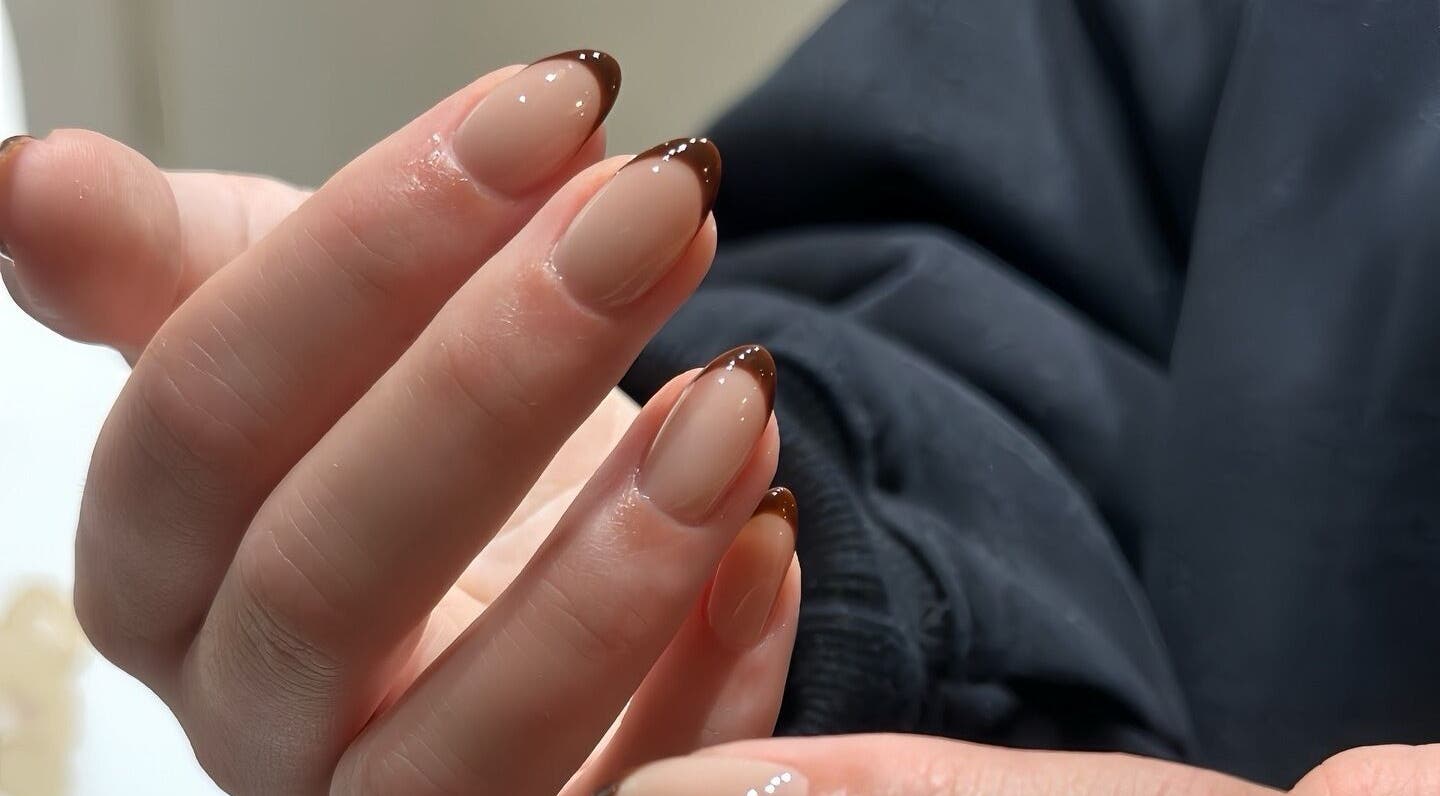 Elegant brown-tipped manicure at Mood Nail Bar, Vancouver, British Columbia, CA.