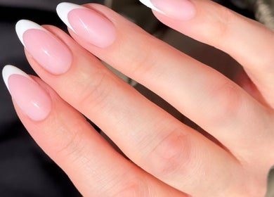 Close-up of elegant French-tip nails at By Tiegan Natasha, Telford, England, GB.