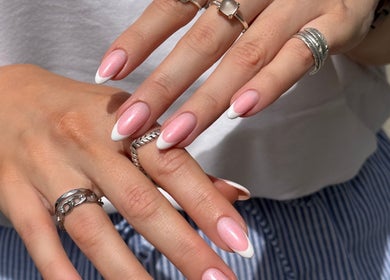 French manicured nails with pink shimmer by Tiegan Natasha at Telford, England, GB. Perfect elegance.