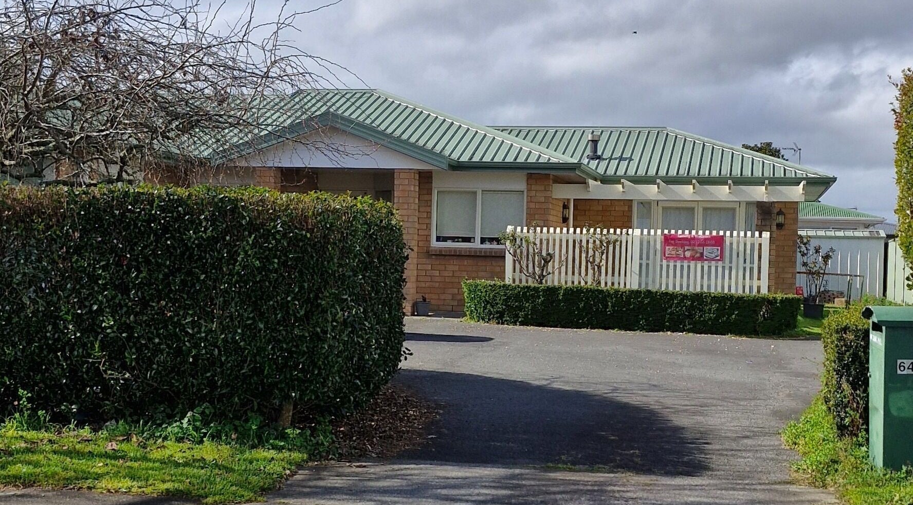 Exterior view of GLOW MASSAGE & AESTHETICS in Hamilton, Waikato, NZ, showcasing its welcoming facade.