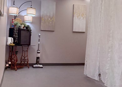 Elegant interior of Lash Brow in Edmonton, Alberta, CA, featuring decorative elements and soft lighting.