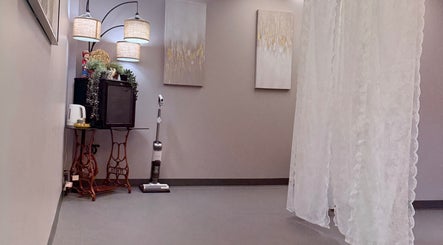 Elegant interior of Lash Brow in Edmonton, Alberta, CA, featuring decorative elements and soft lighting.