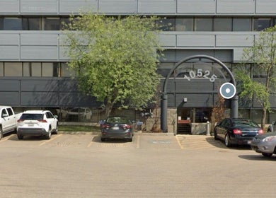 Exterior of Lash Brow located at 10525, Edmonton, Alberta, CA, with modern facade and parked cars.