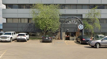 Exterior of Lash Brow located at 10525, Edmonton, Alberta, CA, with modern facade and parked cars.