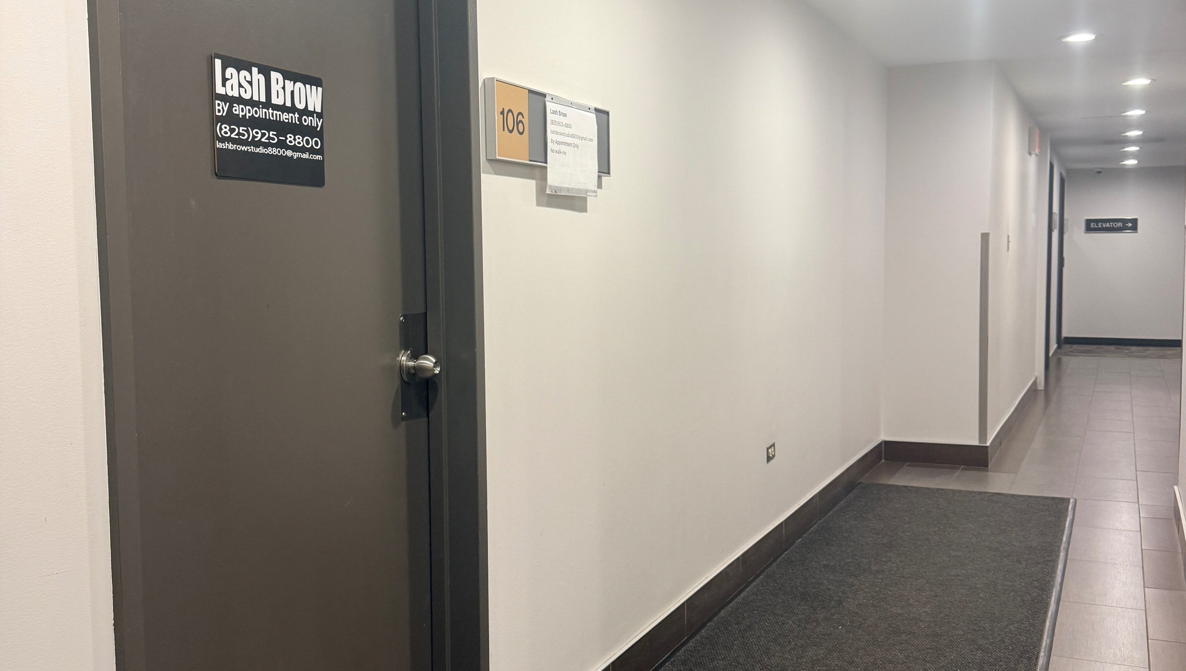 Entrance to Lash Brow studio in Edmonton, Alberta, CA with a sleek hallway view.