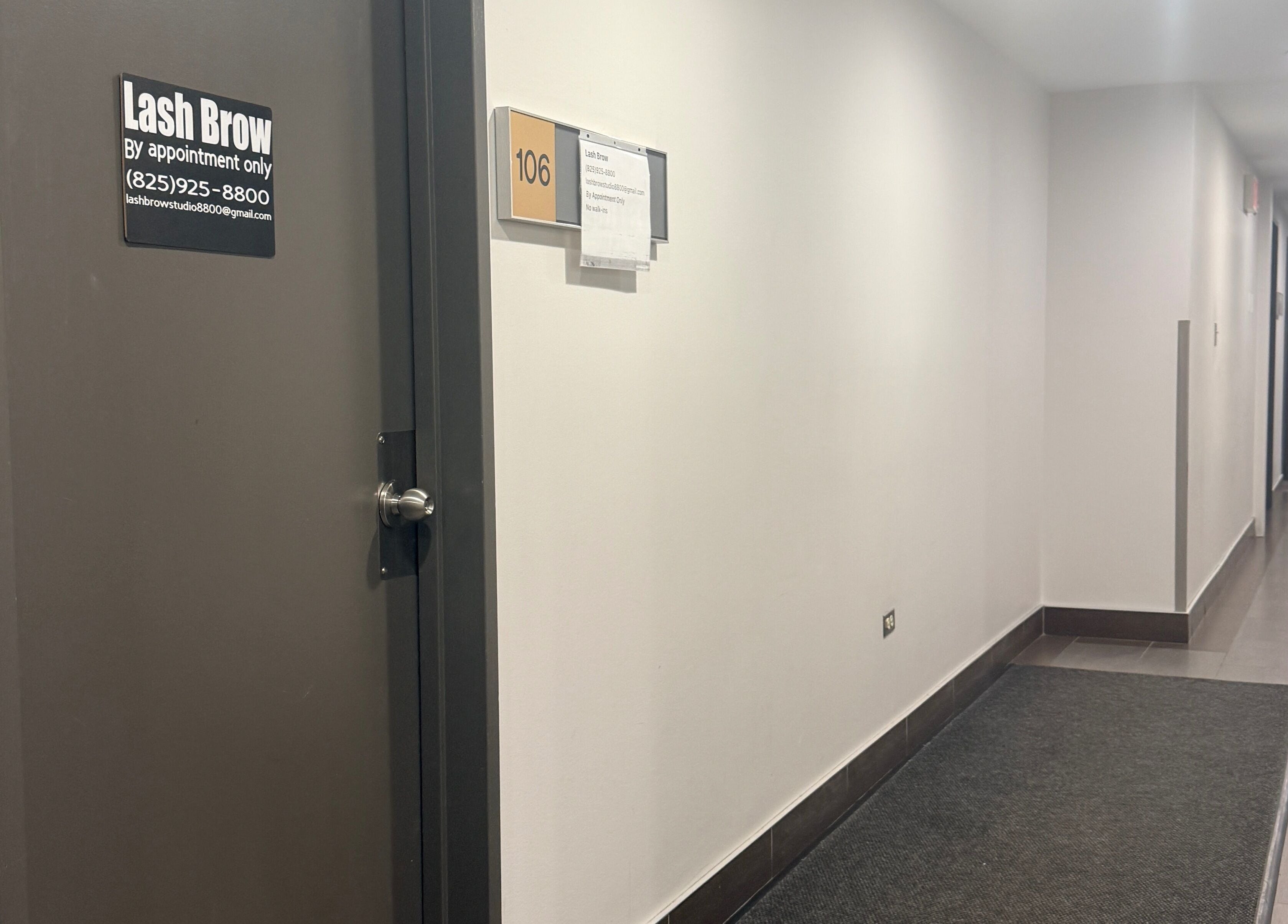 Entrance to Lash Brow studio in Edmonton, Alberta, CA with a sleek hallway view.