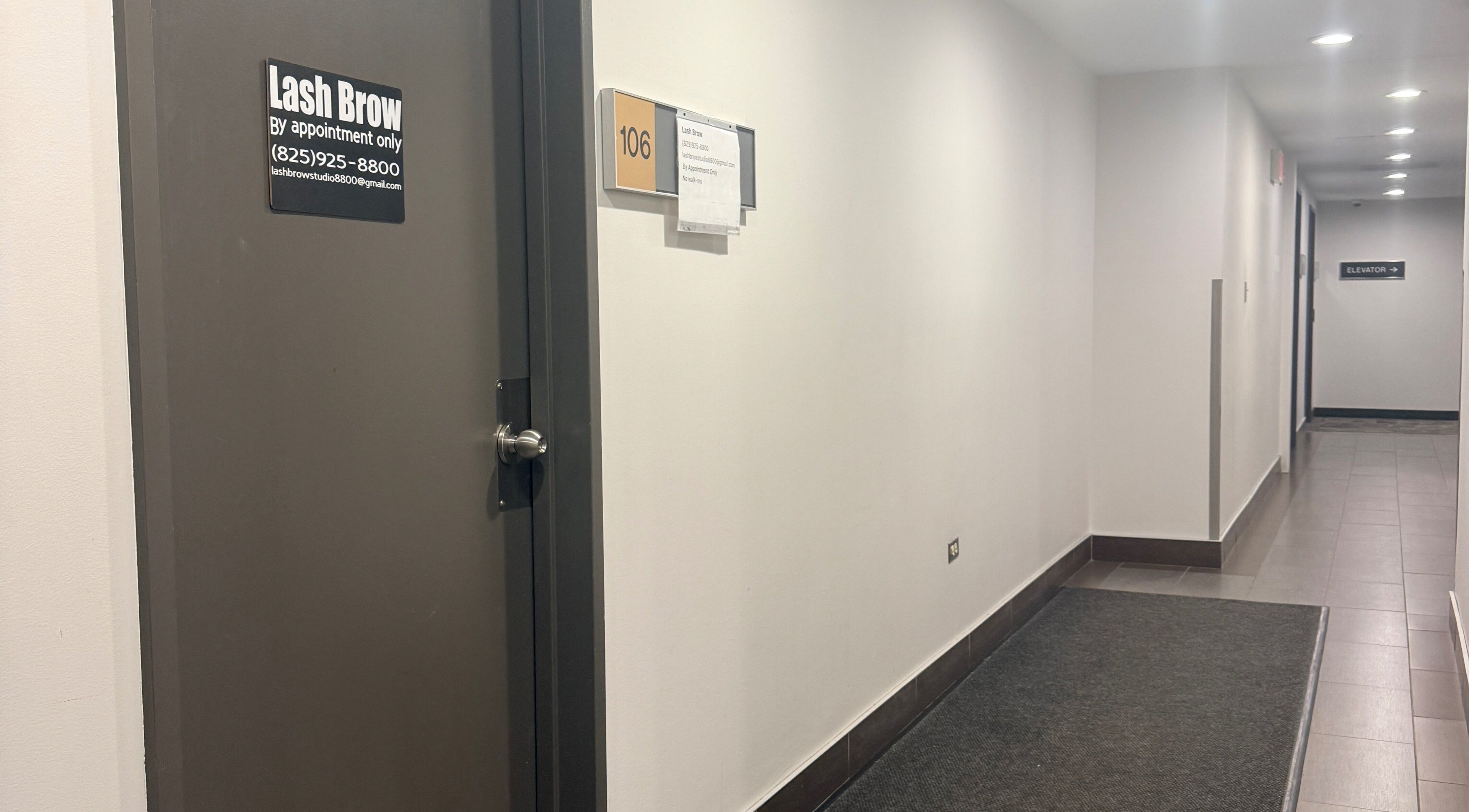 Entrance to Lash Brow studio in Edmonton, Alberta, CA with a sleek hallway view.