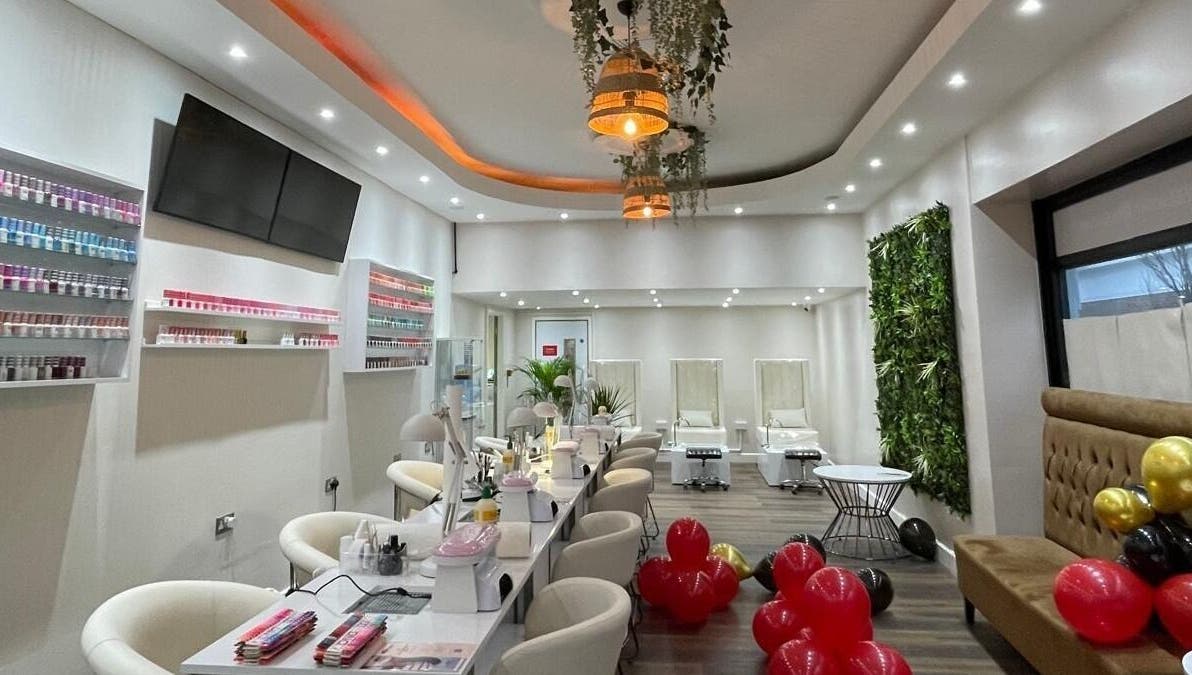 Elegant interior of Buddha Nail Studio in Brighton, England, GB with stylish decor and nail polish display.