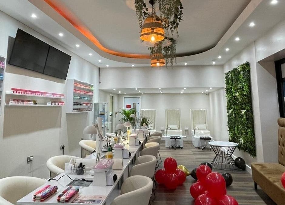 Elegant interior of Buddha Nail Studio in Brighton, England, GB with stylish decor and nail polish display.
