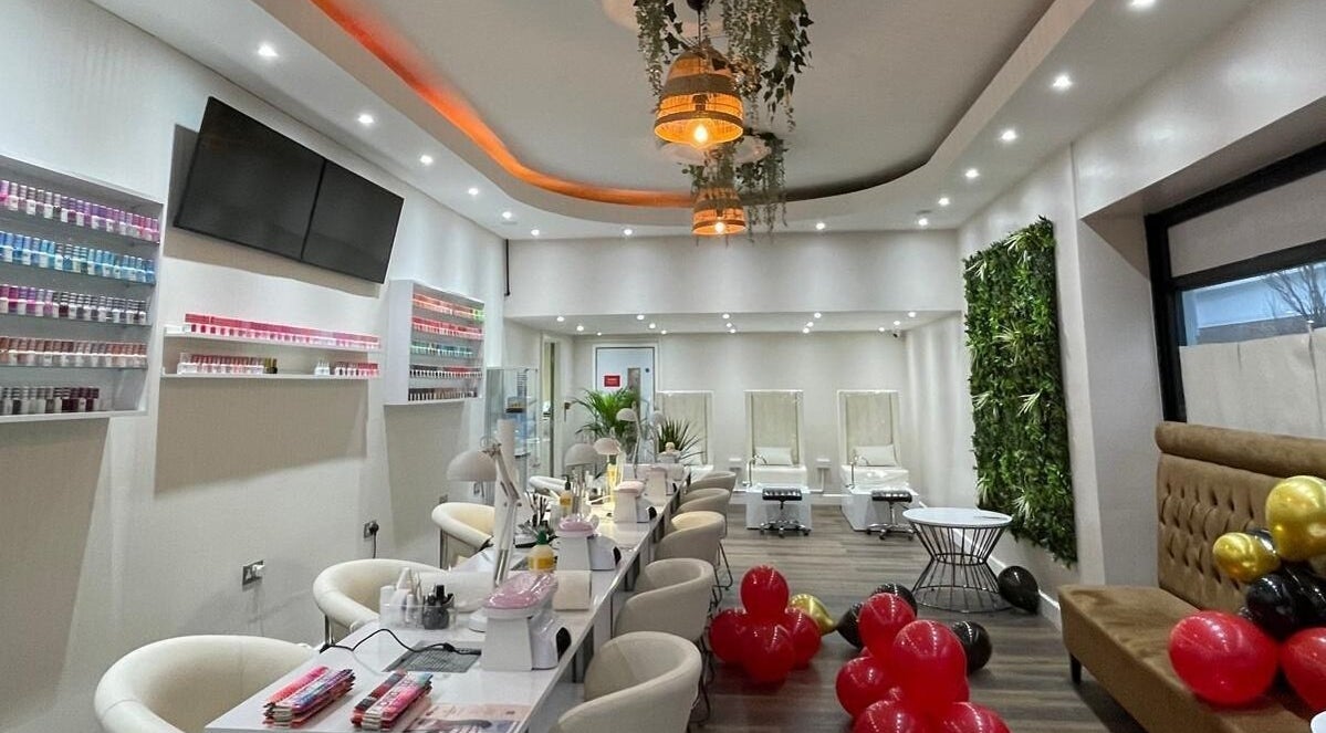 Elegant interior of Buddha Nail Studio in Brighton, England, GB with stylish decor and nail polish display.