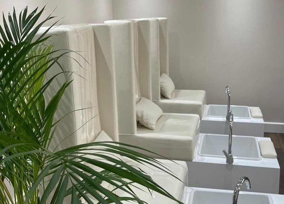 Elegant pedicure chairs at Buddha Nail Studio, Brighton, England, GB, offering a tranquil spa experience.