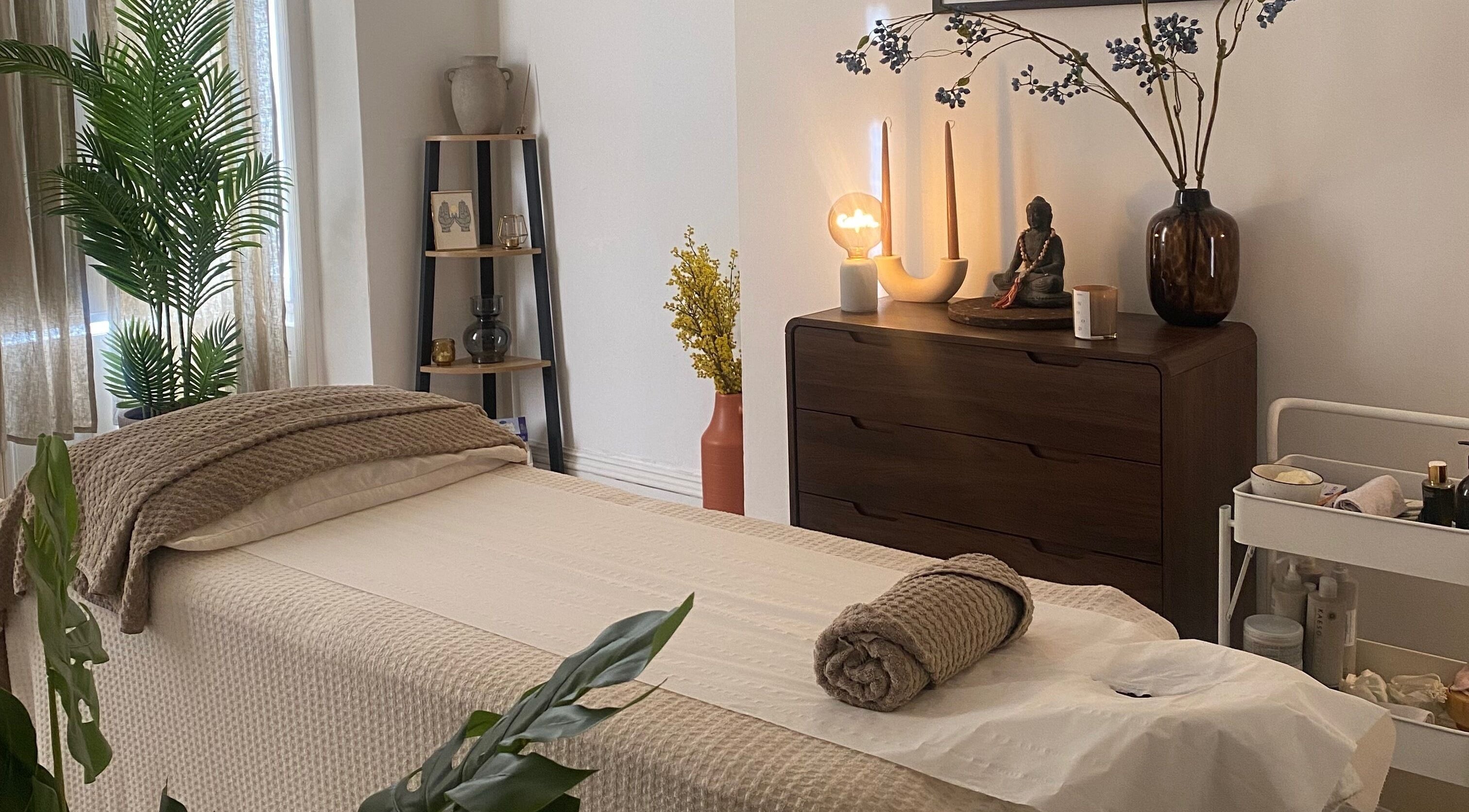 Tranquil massage room at Mind Body Massage, Brighton And Hove, England, GB, featuring calming decor and soft lighting.