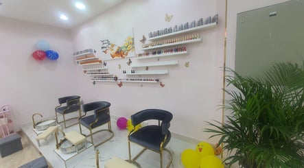 Toplist Nail Beauty Salon's chic pedicure area with seating and decor, Dubai, Dubai, AE.