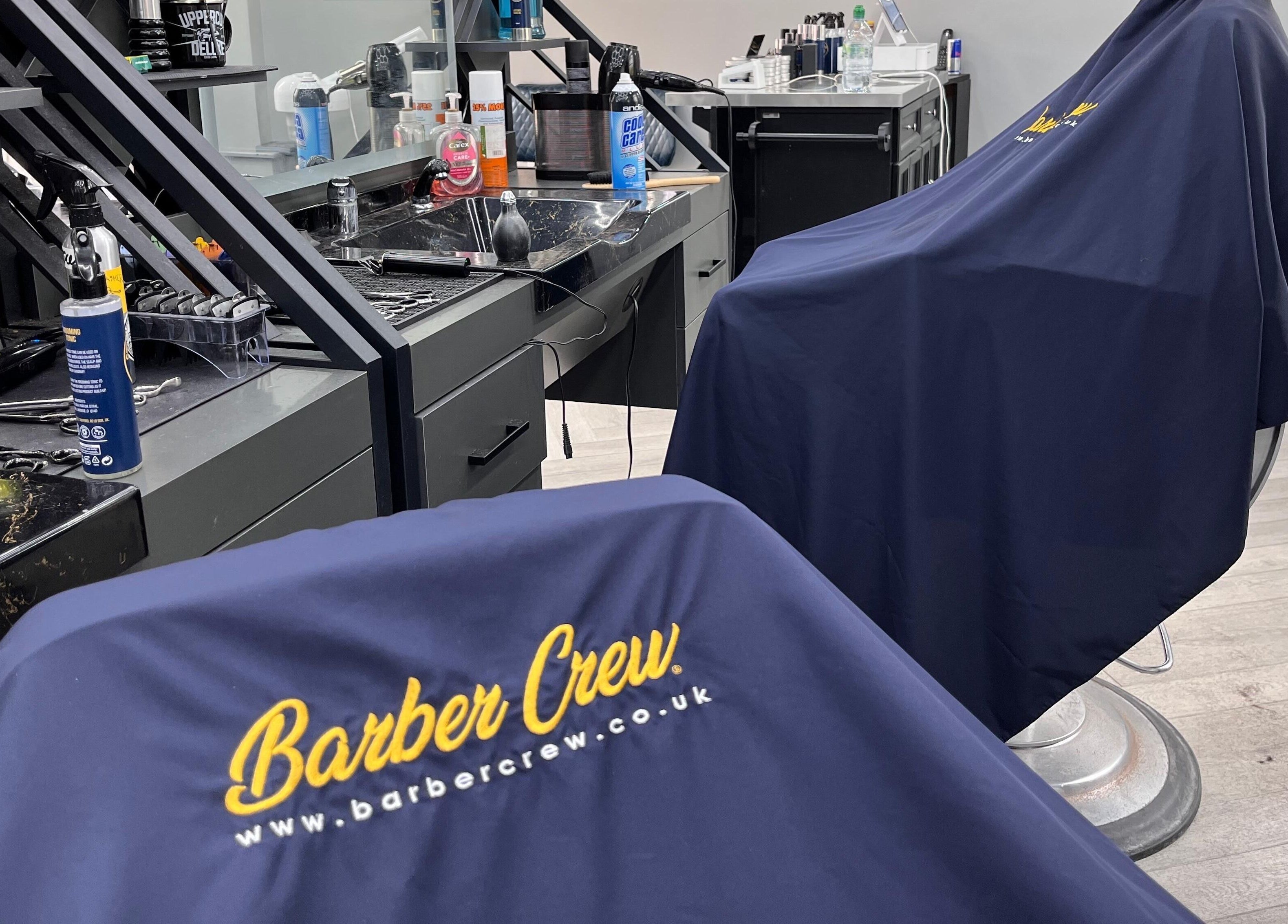 Barber Crew Wokingham salon interior showcasing stylish workstations, Wokingham, England, GB.