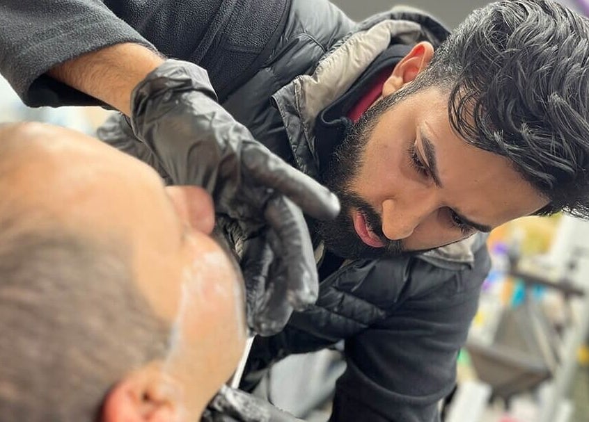 Barber Crew Wokingham stylist expertly grooming a client in Wokingham, England, GB.