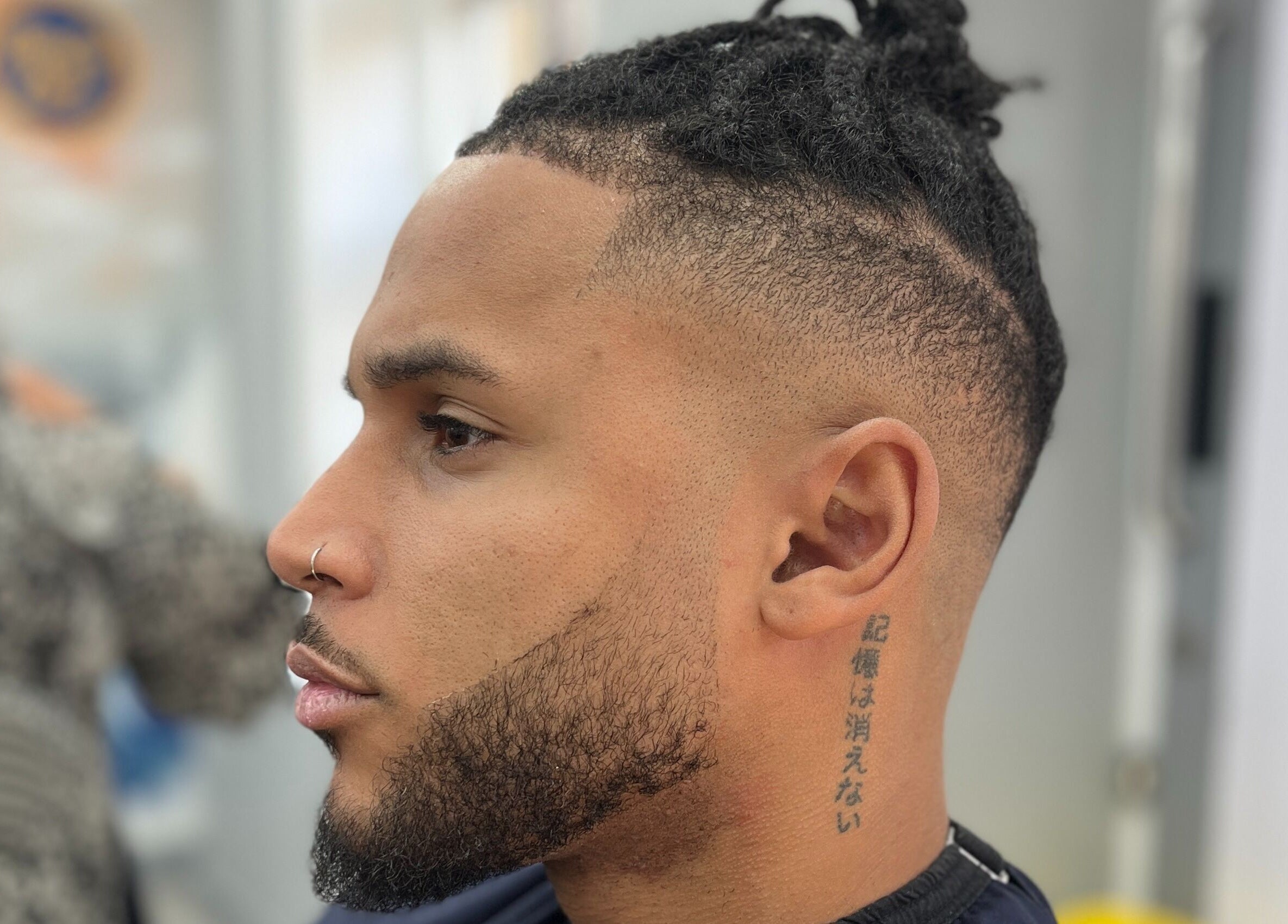 Close-up of a modern fade haircut at Barber Crew Wokingham, Wokingham, England, GB.