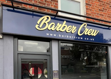 Barber Crew Earley storefront signage in Reading, England, GB featuring bold lettering.