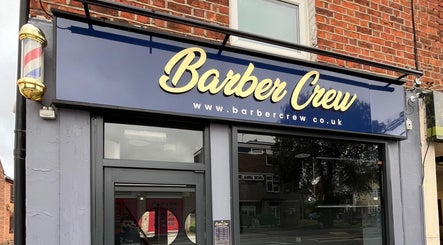 Barber Crew Earley storefront signage in Reading, England, GB featuring bold lettering.