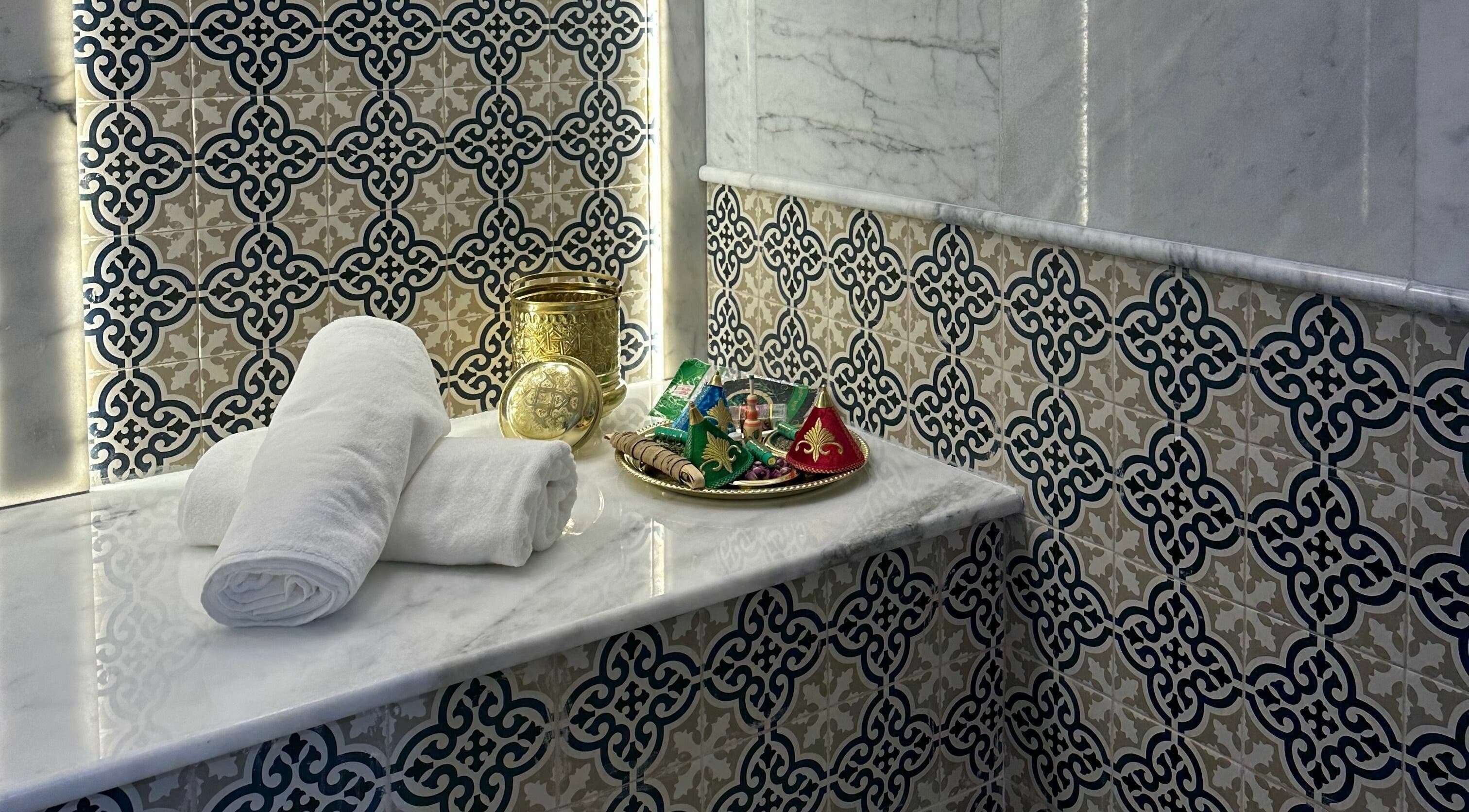 Luxurious spa setup at Hair and Nail Saloon Ajman, عجمان, عجمان, AE with ornate décor and plush towels.