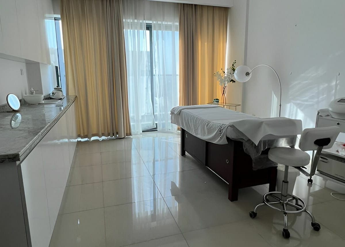 Luxurious spa room at Hair and Nail Saloon Ajman, عجمان, عجمان, AE, with massage bed and natural light.
