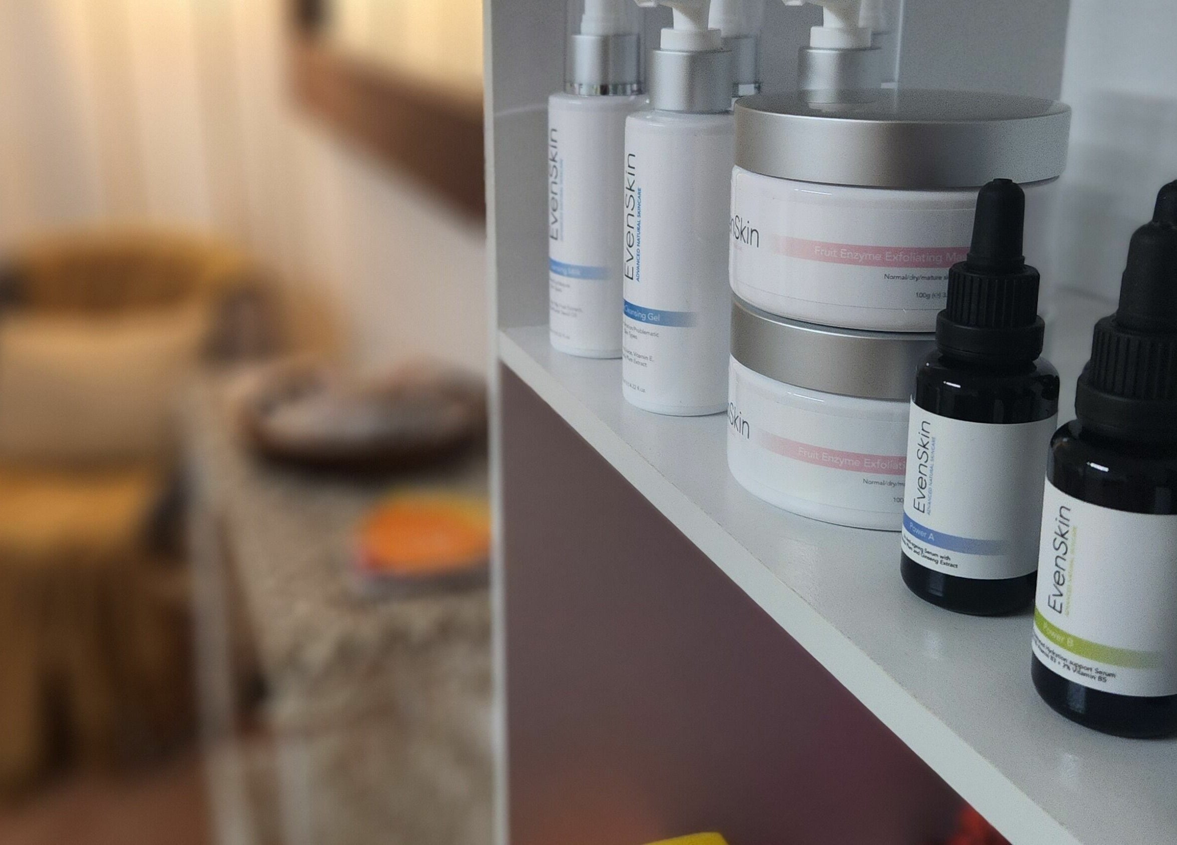 Skincare products on shelf at Authentic Zen Beauty, New Auckland, Queensland, AU, enhancing wellness ambiance.