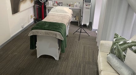 Tranquil treatment room at Johanné Somatology, Cape Town, Western Cape, ZA, featuring a plush massage table.