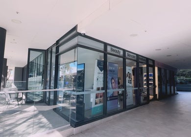 Exterior of Serenity Cosmetic Clinic in Chatswood, New South Wales, AU displaying beauty and skincare signage.