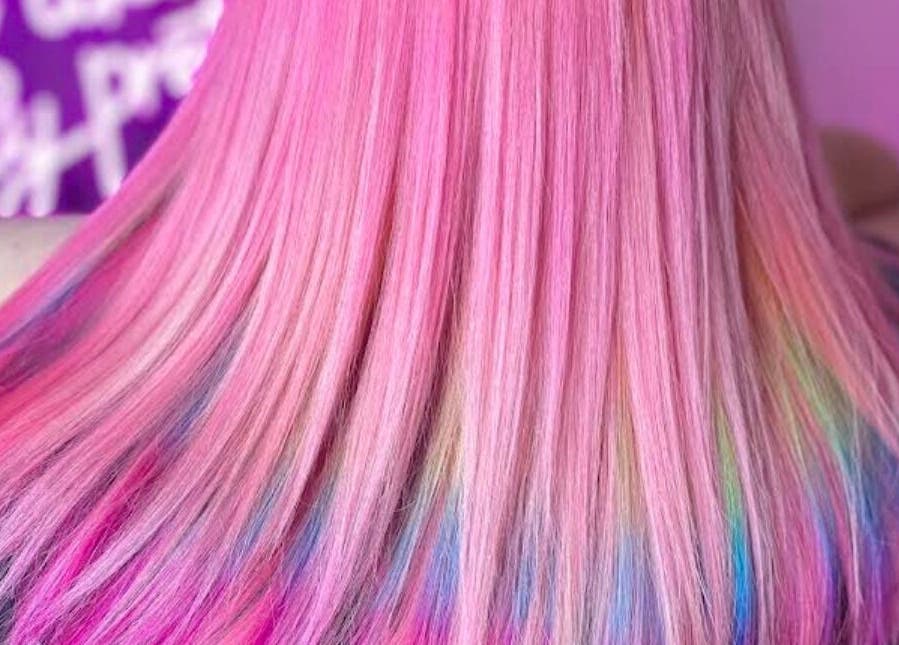 Colorful pastel hair with pink strands at Empress Hair, Hull, England, GB showcasing artistic styling.